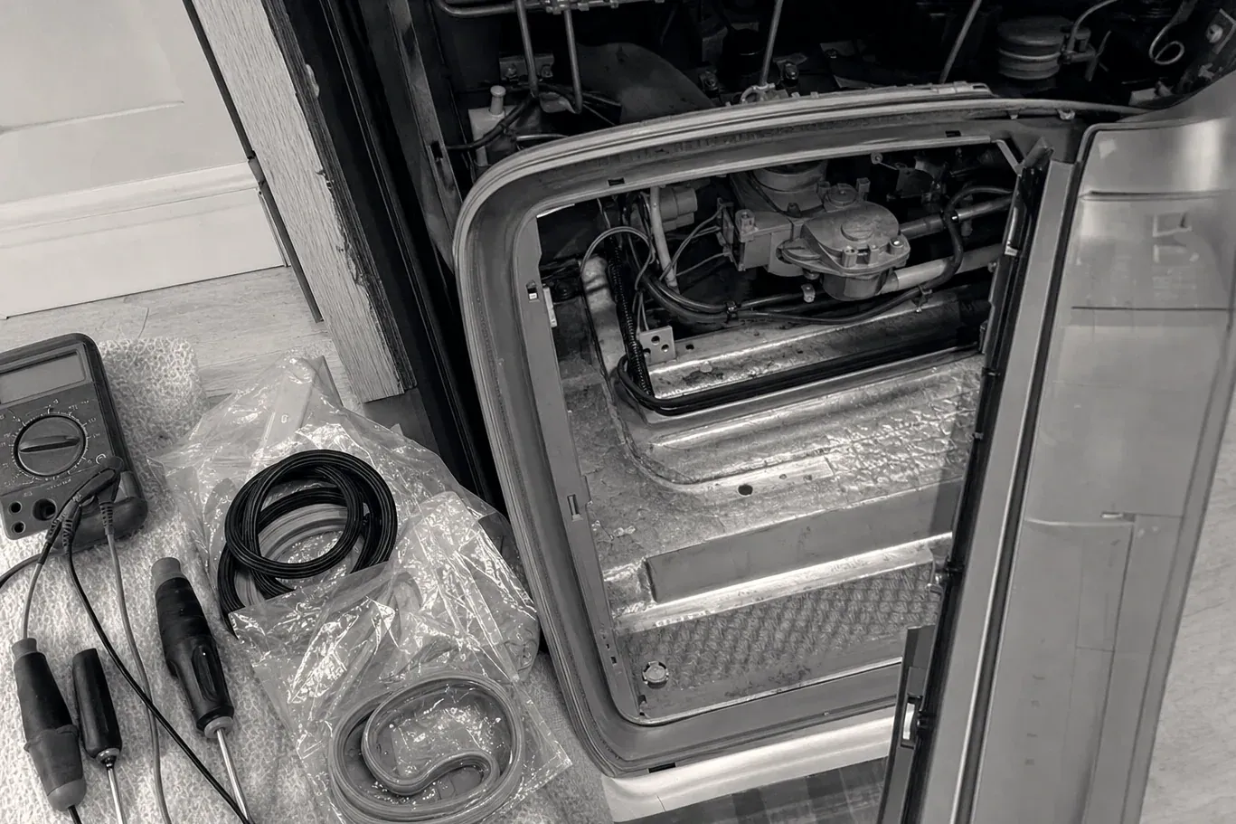 Black and white view of opened unit top with replacement gaskets